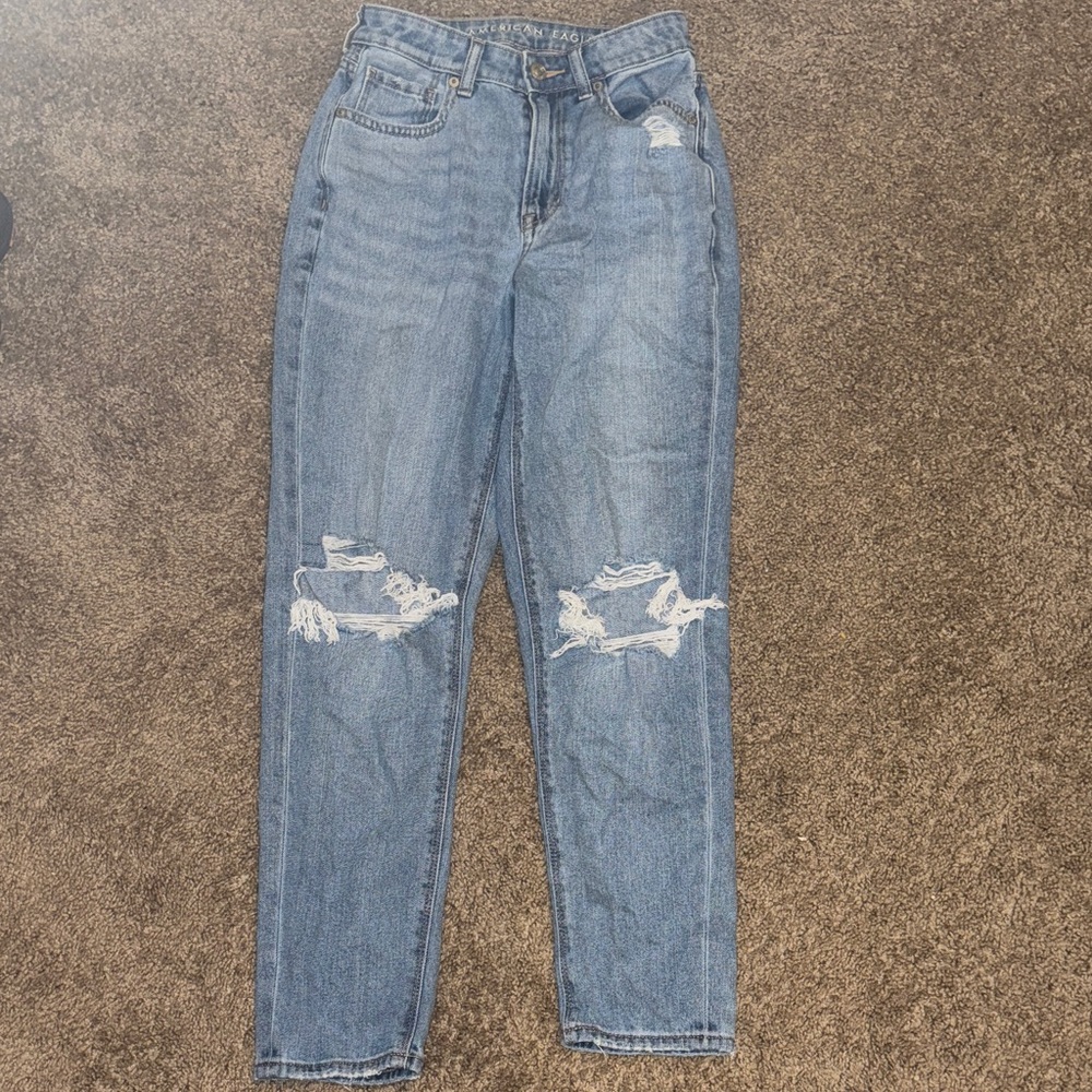 Distressed Blue Women's Mom Jeans by American Eagle gently worn